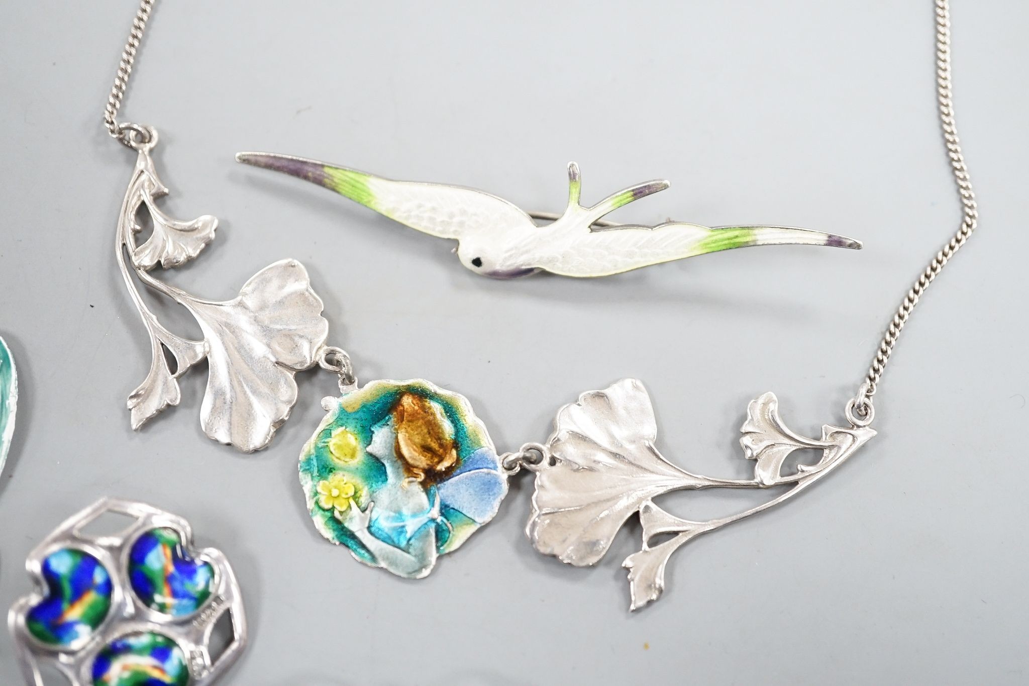 A small collection of early to mid 20th century silver or white metal and enamel jewellery, including brooch by Charles Horner and brooch by Marples & Beasley.